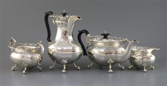 A George V four piece silver tea service set by Gibson & Co, gross 86.5 oz.